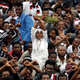 A demonstrator chants slogans while flashing the Oromo protest gesture during celebrations for Irreecha, the thanksgiving festival of the Oromo people, in Bishoftu town, Oromia region, Ethiopia, October 1, 2017.